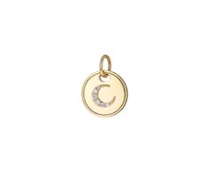 Modern and minimal, add this celestially inspired Foundrae pendant to your favorite chain. The 18K yellow gold mini coin medallion is set with a three dimensional crescent covered in a surface of diamonds. It hangs from the 18K yellow gold bale, creating a pendant that is both modern and timeless. The crescent represents growth. total length : just over 1/2"18K yellow gold medallion : just under 1/2" diameterdiamonds : vary : .5mm diameter to 1mm diameter each18K yellow gold bale *price is for p