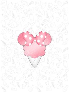 a pink ice cream cone with polka dots on it's top and two bows in the middle