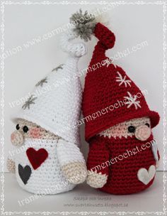 two crocheted stuffed animals wearing christmas hats