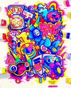 an image of some graffiti art on the wall with crayons and markers around it