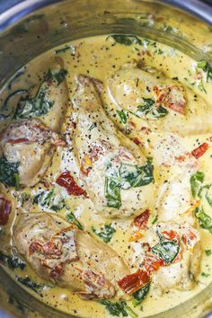 chicken with tomatoes and spinach in a creamy sauce