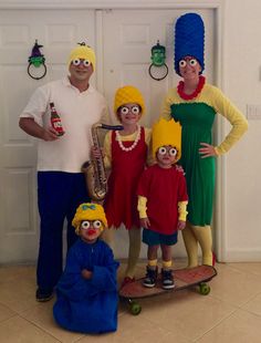 a group of people in costumes standing next to each other