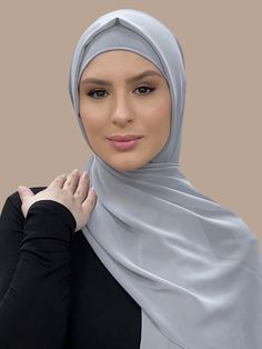 Our Luxury Chiffon Hijab-Chic Grey is perfect for every occasion. With the softest chiffon fabric we could find, our Luxury Chiffon will become your go to hijab whether you're going out to a fancy party or keeping it casual, looking beautiful is effortless! If you're looking for the perfect hijab and under scarf match for this color. We have paired it for you with our Premium Jersey Under scarf Chic Grey (Sold Separately) Fabric: Polyester Chiffon Dimension: 70" x 27" Contour: Long Rectangle Thi Luxury Elegant Hijab For Women, Modest Solid Color Chiffon Hijab, Georgette Hijab Colours, Elegant Solid Chiffon Hijab, Chiffon Hijab Scarfs, Hijab Chic, Fancy Party, Light Texture, Fine Fabric