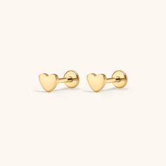 A shiny little reminder that love is all around. Introducing the Nap Earrings Collection - our signature push pin flat backs designed for 24/7 poke-free wear! Made from medical grade titanium to be safe for sensitive skin. And, for the first time, we made them in 20g (aka the same thickness as traditional earrings), so they’re perfect for lobe piercings! The push pin earring posts are easy to insert and remove from your ear, and the flat back makes them super comfortable to wear. One earring, in