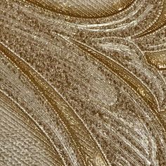 an abstract gold and silver textured background