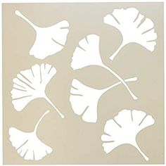 four leaf stencils are shown in white on a light gray background, each one has a different shape