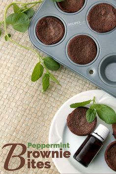 a muffin tin with chocolate cupcakes and a bottle of peppermint brownie bites