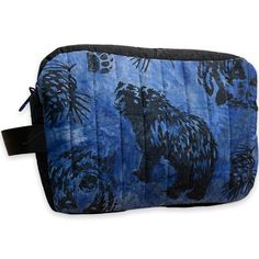 a blue and black bag with bears on it