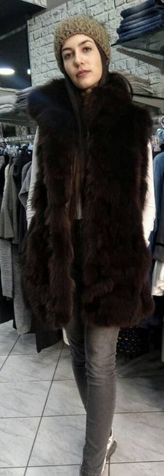 New Natural Real Long Fox fur vest in chocolate dark brown color,soft, light and warm! Leather Belt included.The cap with the fox pom is for sale also! Good quality made from us,the best Greek fur specialists! We take orders in any size,color,model! Wholesale-retail No returns accepted. Fluffy Brown Fur Coat For Winter, Brown Faux Fur Coat With Feather Trim, Fluffy Brown Fur Coat For Cold Weather, Brown Faux Fur Coat For Cold Weather, Brown Fur Vest, Fox Fur Vest, Fox Hat, Fur Bag, Fox Fur Coat