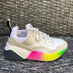 New Stella Mccartney Eclypse Rainbow Chunky Sole Sneakers. Retail $625.00. Size: 32eu/Fits 5.5/6us. Color: White Rainbow. Eye-Catching Sneakers With Chunky Soles And Bright Pops Of Cheerful Colors. Fabric: Vegan Design With Faux Leather, Suede And Pebble Textures. Rainbow Logo Print. Platform Sole. Lace-Up Closure. Rounded Toe. Rubber Sole. 2" Heel, 9" Insole, 3.5" Width, Approximately. Made In Italy. Condition: New Store Display Shoes With Minor Scuffs/Stains. Box Not Includ Display Shoes, Vegan Design, Rainbow Logo, Sole Sneakers, White Rainbow, Store Display, Logo Print, Stella Mccartney, Rubber Sole