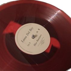 an old red record with white label on it