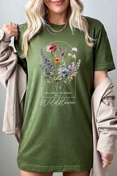 Field of Roses Be A Wildflower Floral Meadow Graphic T Shirts.Unisex Crew Neck Short Sleeve Tees.Crafted from premium materials, tailored to your lifestyle, ensuring a comfortable fit for any occasion.Family Group Uniforms Birthday Party Gift Concert Festival Events.High Quality Direct To Film Printed Graphic Design.100%COTTON,HEATHER(52%COTTON,48%POLY),ATH.HEATHER,BLACK HEATHER(90%COTTON,10%POLY)NICARAGUAMade In: Nicaragua Be A Wildflower, Field Of Roses, Floral Meadow, Concert Festival, Film Prints, Graphic Design Print, Birthday Party Gift, Heather Black, Graphic Prints