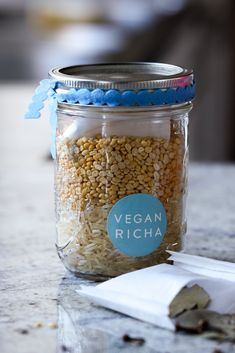 a jar filled with food sitting on top of a table