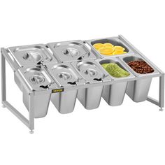 a stainless steel tray with six compartments and food