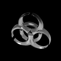 a metal object that looks like a biohazarde on a black background, it appears to be in the shape of a symbol