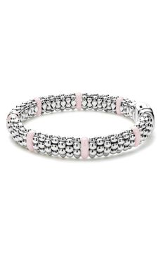 A single band of diamonds enchants this polished bracelet crafted with sterling silver Caviar beading and pink ceramic stations. Exclusive retailer Total diamond weight: 0.01ct. Color: G–H Clarity: I Sterling silver/ceramic/diamond Imported Luxury Pink Stackable Jewelry, Luxury Pink Beaded Bracelets, Pink Rondelle Elegant Jewelry, Elegant Pink Rondelle Jewelry, Elegant Pink Sterling Silver Bracelets, Elegant Pink Stackable Bracelets, Elegant Pink Beaded Jubilee Bracelet, Elegant Pink Jubilee Beaded Bracelets, Elegant Pink Sterling Silver Round Bracelet