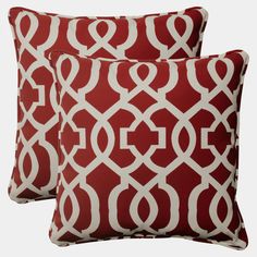 two red and white decorative pillows