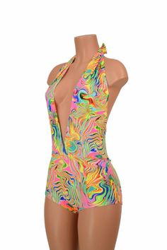 "This item is made to order, please read all the way through the listing before purchasing! This bodysuit is made of super bright neon flux uv glow print spandex! This fabric is beautifully smooth, breathable, very durable, and crazy stretchy. Deep V neckline and tie back halter top. Four way stretch for a figure forming fit. This bodysuit is unlined. Womens Sizing (See below for instructions on where measurements should be taken) XXS: Bust 29\"-30\" / Waist 22\"-23\" / Hips 30\"-32\" Extra Smal High Stretch Summer Swimming Unitard, High Stretch Unitard For Club In Summer, Multicolor Stretch Rave Unitard, Rave Multicolor Bodysuit For Club, Rave Style Multicolor Bodysuit For Club, Multicolor Swimwear For Spring, Fitted Rave Swimwear, Multicolor Club Swimwear For Spring, Multicolor Swimwear For Club In Spring