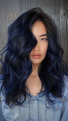 Discover the mesmerizing allure of Blue Black hair, a captivating hue merging deep midnight tones with hints of sapphire. Dive into our curated collection of 26 Blue Hair Color Ideas for 2024 and unlock the key to effortless sophistication. Click the pin to explore more trending shades and join our journey! #BlueBlackHair #HairColorIdeas #TrendingShades #2024HairTrends #HairInspiration Black To Dark Blue Ombre Hair, Dark And Blue Hair, Best Hair Color For Black Hair, Blue Jean Hair, Midnight Blue Hair Ombre, Midnight Blue Balayage, Blue Black Balayage, Black Hair With Blue Undertones, Dark Brown Hair With Blue Highlights