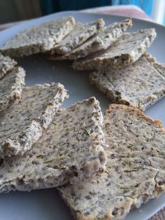 several pieces of bread on a white plate