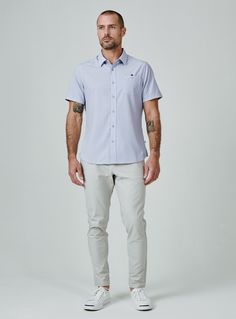 We created the perfect short sleeve button up, with the right mixture of comfort and style, just for you. Our performance shirts have 4-way stretch, are moisture wicking, wrinkle resistant and above all a great new addition to your wardrobe. The performance shirt will be your go-to for any occasion - day to night. This is a shirt that will have you satisfied at any given time. Details Model is 6'1" and wears a size medium. Care: Machine wash cold on delicate cycle with similar colors. Do not use Casual Short Sleeve Shirt With 4-way Stretch, Short Sleeve Button Up, Dusty Blue, Lifestyle Brands, Short Sleeve Shirt, New Product, Moisture Wicking, Sleeve Shirt, Fashion Forward