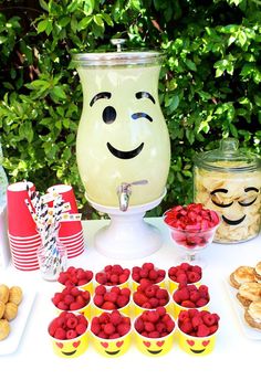 a table topped with lots of desserts and drinks