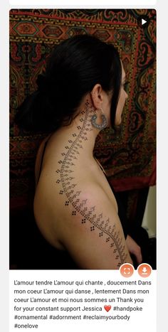 the back of a woman's neck with an intricate tattoo design on her left side