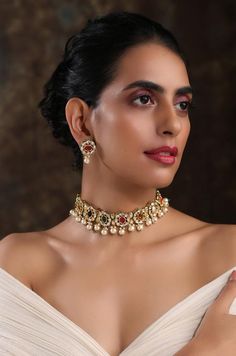 Royal Indian kundan necklace. This beautifully handcrafted necklace is set in copper alloy and plated with 22k gold. Elegant and modern, this kundan and necklace will complete your lavish ensemble in grandeur.  Necklace Closure - Adjustable DoriEarrings Closure - Push Back Necklace - 14 inches, Earrings - 1.25 inchesStyle Tip - The outfits that we put together on a daily basis are nothing really spectacular, but wouldn’t you just love to jazz up your basics by adding a navrattan statement neckla Navrattan Choker, Choker Set Gold, Timeless Jewellery, Luxury Jewelry Store, Necklace Closure, Royal Indian, Nice Face, Work Necklaces, Back Necklace