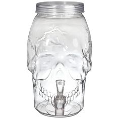 a glass jar with a skull head on it