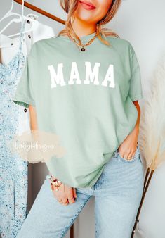 "Comfort Colors® Mama Shirt, Mom Shirt, Pregnancy Announcement, Mommy Shirt, Mama T-Shirt, Mom Life Shirt, Girl Mama, New Mom, Gift for Mom Perfect gift for a special MAMA in your life.  Perfect for new moms ♥ 📋 HOW TO ORDER: 1. Select the size 2. Select the color 3. Select the quantity  4. Add personalization if required 5.Add to Cart (\"buy now\" will take you directly to checkout and \"add to cart\" will allow you to continue shopping with us) 6. Submit order (Shipping will automatically be Casual Family T-shirt With Name Print, Relaxed Fit Cotton Shirt For Mother's Day, Casual Family T-shirt For Spring, Spring Casual Family T-shirt, Casual Relaxed Fit Shirt For Family Events, Spring Family Cotton Tops, Casual Tops With Graphic Print For Family, Spring Cotton Tops For Family Occasions, Casual Short Sleeve Tops For Family