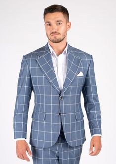 Feel polished and confident in the Astor Blue Windowpane Suit. Crafted from lightweight fabric, this bright and fresh piece has a timeless look that will make you stand out. Perfect for work or a special event, this custom made suit will help you make a lasting impression. Luxury Fitted Suits For Spring, Tailored Blue Professional Blazer, Fitted Blue Suits For Spring, Fitted Formal Suits For Spring, Fitted Suits For Formal Spring Events, Fitted Suits For Spring Formal Occasions, Fitted Suits For Spring Formal, Blue Custom Fit Suits With Notch Lapel, Fitted Suits In Suiting Fabric For Spring