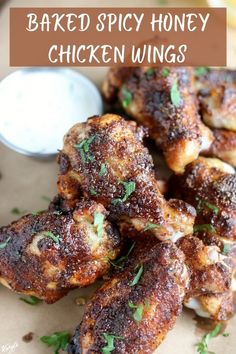 chicken wings with parsley and ranch dressing on the side