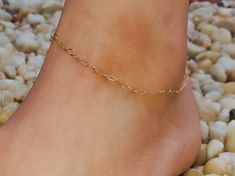 READY TO SHIP ~ MOTHERS DAY GIFT This gorgeous 14k gold fill chain anklet is hand made and comes in 2 different chain designs. Choose your design at checkout or purchase 1 of each for a little discount. Elongate Cable as well as Curb Figaro Cable chains are both is 2.0mm wide Wear with confidence in and out of the water this quality anklet can be worn 24-7 gold fill is a long lasting product and will never turn green or color will not rub off. Each being 10 inches long and adjustable because the Ankle Bracelets Gold, Womens Ankle Bracelets, Anklet For Women, Gold Anklet, Ankle Bracelet, White Jewelry, Chain Anklet, Anklet Jewelry, Body Jewellery