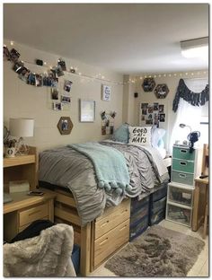 a dorm room with a bed, desk and drawers