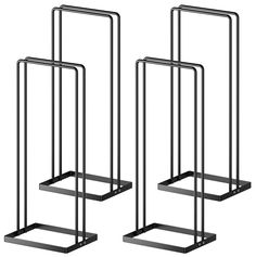 three black metal shelves with one shelf on each side