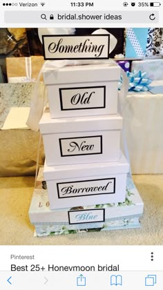 three white boxes stacked on top of each other with the words bridal shower gifts wrapped in