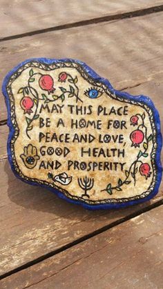 a plaque that says, be a home for peace and love good health and prosperity