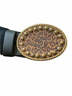 A Cheetah leather belt buckle with decorative accents is a stylish choice! The printed cheetah leather is accented with a little bling using decorative square metal spots. The oval rope buckle is easy to add to your favorite belt. Dress up your outfit with a unique handmade buckle when your look needs a little extra something. The buckle can be paired with many of Brooklyn Buckles interchangeable snap belts. This listing is for a buckle only but the belt can be purchased for an additional cost. Western Cowgirl Style, Cowboy Buckle, Leather Belt Buckle, Handmade Leather Belt, Western Belt Buckles, Silver Belt Buckle, White Plains, Beautiful Belts, Silver Belts