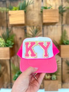 This KY Trucker Hat is the perfect way to stand out in any crowd. It features a bright neon pink design that will make you stand out, and an adjustable strap and mesh back to ensure a comfortable fit. Get noticed in this fashionable and functional trucker hat. Pink Snapback Hat For Spring Sports, Pink Snapback Hat For Sports In Spring, Trendy Pink Snapback Hat With Visor, Casual Pink Mesh Baseball Cap, Hip Hop Pink Snapback Hat, Pink Mesh Baseball Cap For Summer, Trendy Mesh Snapback Hat For Spring, Pink Mesh Trucker Baseball Cap, Pink Mesh Trucker Snapback Hat