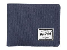 Herschel Supply Co. Roy RFID - Wallet Handbags : Navy/Red : Over-thinking your wallet situation? Don't fret, the simple and functional Herschel Supply Co. Roy RFID wallet has you covered! RFID protection. Classic textile bi-fold wallet. Currency sleeve and multiple credit card slots. Woven logo patch adorns front. Engineered red and white striped tab. Imported. Measurements: Bottom Width: 4 1 2 in Depth: 1 in Height: 3 3 4 in Handle Drop: 4 in Weight: 1.8 oz Casual Bifold Wallets With Coin Pocket, Casual Bifold Wallet With Coin Pocket, Casual Trifold Wallet, Casual Wallets With Card Slots, Casual Bifold Wallet For Everyday Use, Casual Everyday Trifold Wallet, Casual Rectangular Wallet With Coin Pocket, Blue Casual Wallets With Rfid Blocking, Casual Blue Wallets With Rfid Blocking