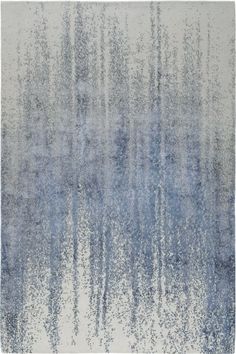 an abstract rug with blue and white colors