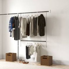 an organized closet with clothes and shoes hanging on the rack, next to a window