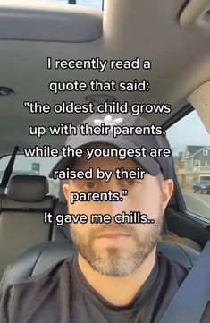 a man sitting in the back seat of a car with a quote on his face