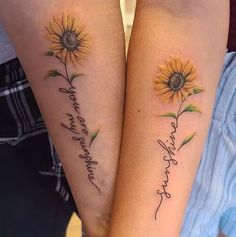 two sunflowers with words written on their arms