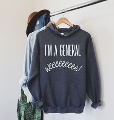 a sweatshirt that says i'm a general weeeeeee on it