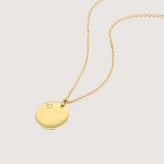 The Chiara necklace is a light gold round disc necklace that you just NEED. Wheather you wear it alone or stacked, with your another necklace or bare alone- it's perfect. Add a personal touch to your Chiara necklace with an engraved portrait of a loved one on one side and their name engraved on the opposite side. If you can dream it- we can make it happen. All features can be customized! Talk to us, we love making custom designs. Our jewelry is carefully handmade in our atelier To order by phone Minimalist Round Coin Necklace, Everyday Necklace With Round Star Charm Pendant, White Gold Necklace With Star Charm, Everyday Round Pendant Necklace With Star Charm, Minimalist Round Necklace With Star Charm, 14k Gold Necklace With Star Charm And Round Pendant, Minimalist Yellow Gold Round Medallion Necklace, Sterling Silver Necklace With Star Charm, Rose Gold Round Disc Necklace For Everyday