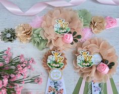 some flowers and ribbons on a table