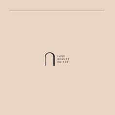 the logo for luxury boutiques is shown in black and white on a beige background