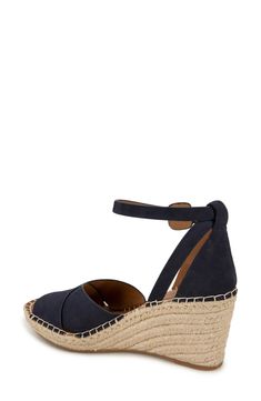 An earthy espadrille-style wedge keeps your look warm-weather ready in a stylish leather sandal complete with a well-cushioned footbed for endless comfort. 3" heel Multilayered, PORON®-cushioned footbed Leather upper and lining/rubber sole Imported Comfortable Espadrille Wedge Heel Sandals, Cushioned Medium Width Wedge Sandals For Beach, Vacation Wedge Sandals With Leather Footbed, Espadrille Wedge Sandals With Textured Footbed, Vacation Wedge Heel Espadrilles With Cushioned Footbed, Open Toe Espadrilles With Cushioned Footbed, Synthetic Espadrilles With Cushioned Footbed And Ankle Strap, Synthetic Ankle Strap Espadrilles With Cushioned Footbed, Leather Espadrilles With Cushioned Footbed And Wedge Heel