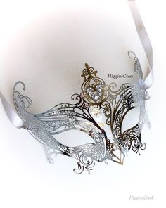 Beautiful Venetian ladies masquerade mask is beautifully adorned with Crystal Rhinestones. Great for Weddings & Gold themed Masquerade Parties and even Halloween & Mardi Gras. It's light weight and conforms to your face effortlessly. S H I P P I N G - Processed same day or within 24 hours. 1-2 day guaranteed delivery services offered, add items to cart and click on shipping tab for rates. Pls leave a check out note with your need date & contact number (especially for expedited and cu Fantasy Masquerade Mask For Festivals, Silver Fantasy Costume Mask, Silver Fantasy Carnival Mask, Elegant Silver Masks As Gift, Silver Fantasy Mask For Carnival, Silver Fantasy Masks For Carnival, Silver Fantasy Masks And Prosthetics For Masquerade, Fantasy Silver Masquerade Mask For Carnival, Silver Fantasy Masquerade Mask For Carnival